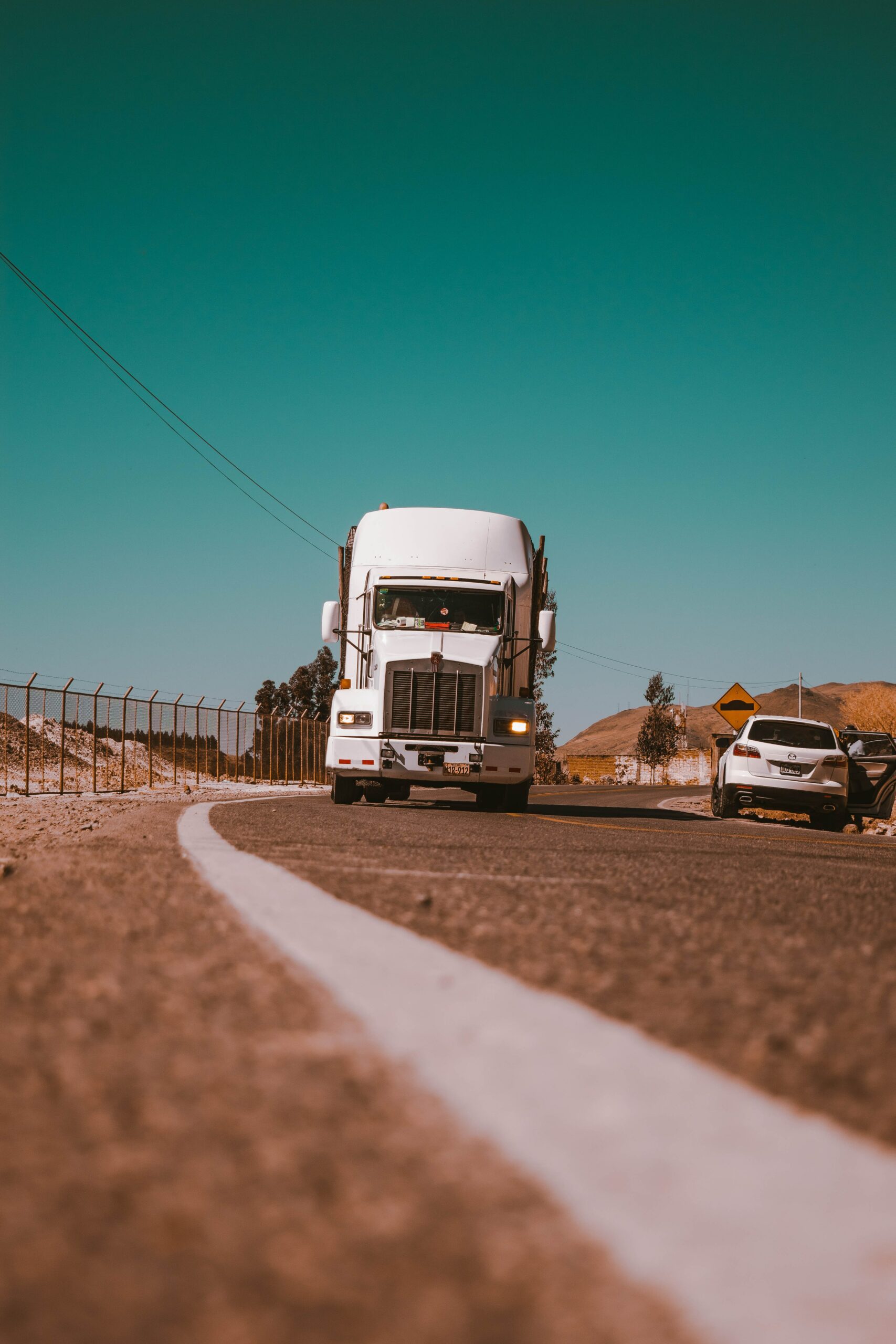 big white truck on the road